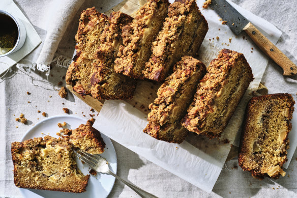 This apple crumble cake features a crumble layer along its centre.  