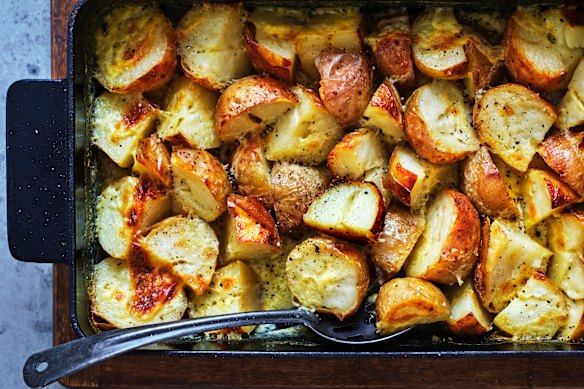 Grill Adam’s roasted scalloped potatoes at the end to give them a golden glow.