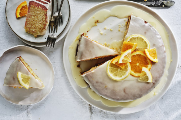 Glaze the cake, then garnish with a few slices of orange and lemon. 