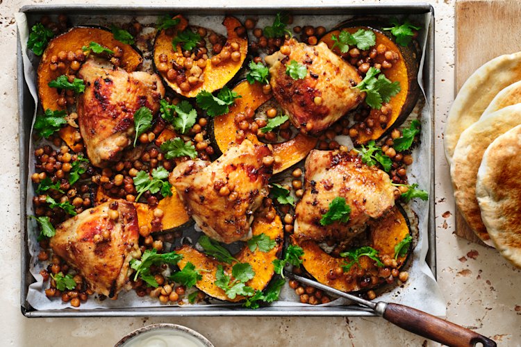 Serve this one-pan chicken, pumpkin and chickpea dish with flatbread (pictured right) or steamed rice.