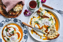 Cilbir with Ramazan pidesi (Turkish eggs with flatbread).