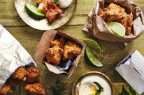 Fish pakoras with turmeric yoghurt and lime.