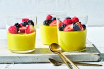 Spiced lemon posset with summer berries.