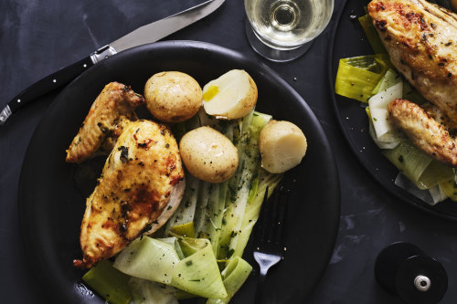 Mustard and herb roasted chicken breast with buttered leeks.