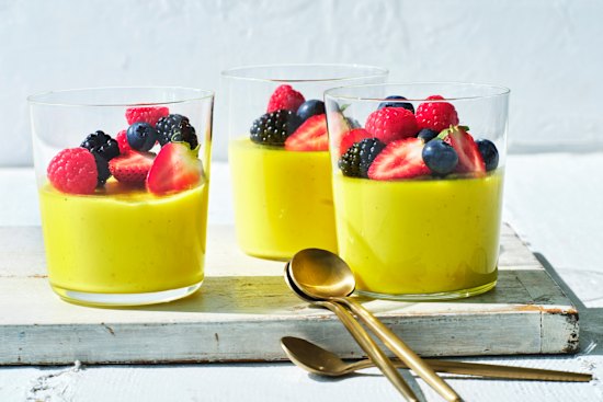 Spiced lemon posset with summer berries.