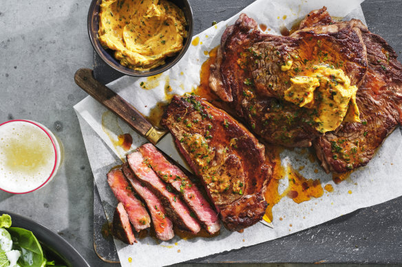 Rib-eye steaks with hot butter.