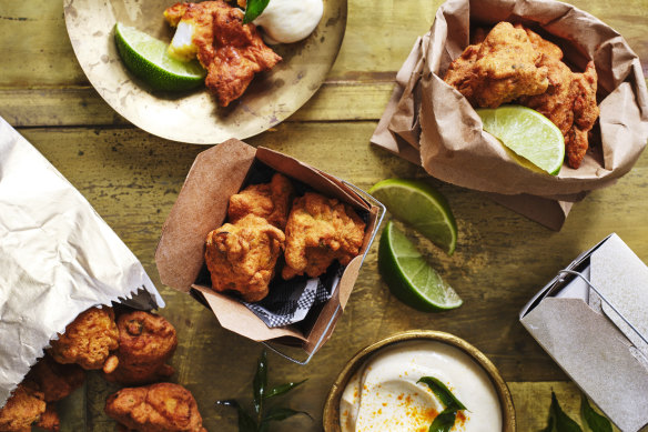 Fish pakoras with turmeric yoghurt and lime.