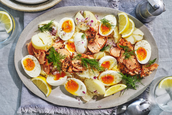 Hot smoked salmon with dill, eggs and new potatoes.