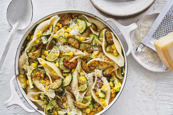 Pasta shells with zucchini and corn.