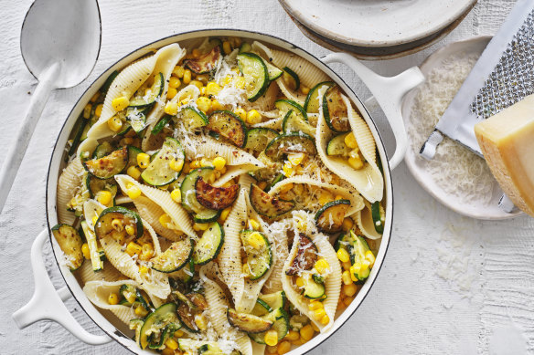 Pasta shells with zucchini and corn.