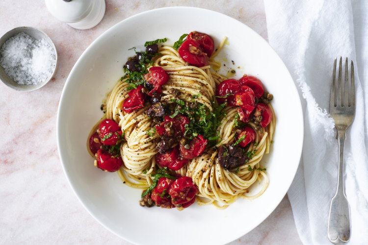 Spaghetti with blistered cherry tomatoes.