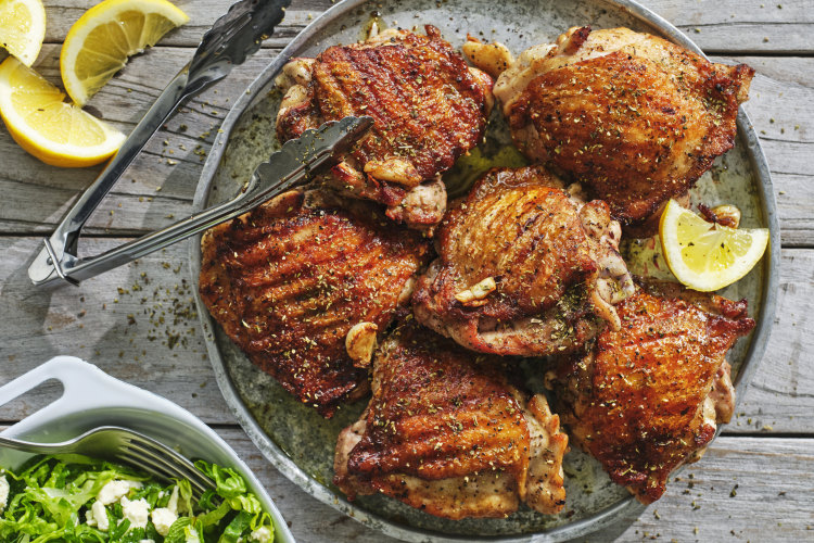 Chicken cutlets with garlic, lemon and oregano.