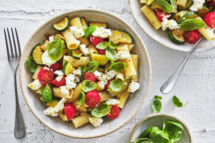 Rigatoni with zucchini and cherry tomatoes.