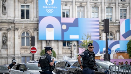 French police patrol the city ahead of the Olympic Games.