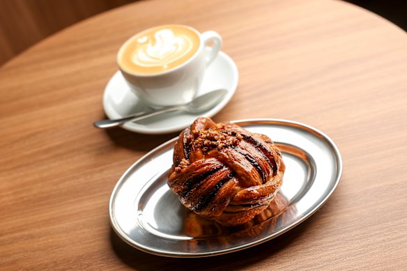 Honey-glazed babka with cinnamon and candied walnut.