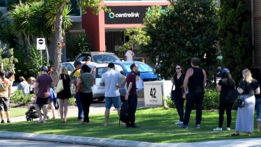 People line up at Centrelink in Perth this week.