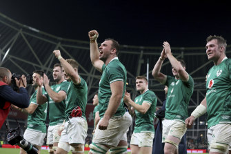 Ireland players celebrate their victory over New Zealand.