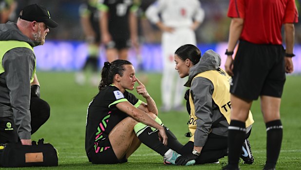 Raso undergoes a concussion test.