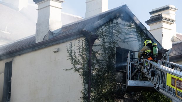 Fire crews battle a house fire in Glebe. 