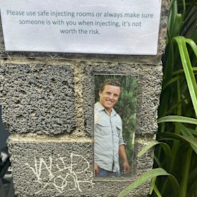 Danial Korver, and a note from his parents at the site of his overdose on Rainbow Alley.
