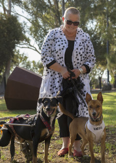 Annie Whitlocke with her rescued dogs.