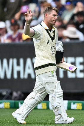 David Warner waves goodbye to the MCG crowd on what will be his last Test inning at the ground.