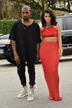 Rapper Kanye West (with Kim Kardashian West) in his Yeezy 750s, which fetch top dollar on the resale market.