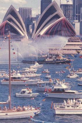 The ribbons cascaded into the harbour releasing 60,000 hydrogen-filled balloons and a thousand white doves and pigeons.