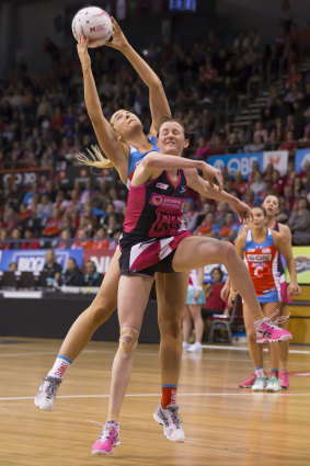 Sophie Garbin wins this battle with the Thunderbirds' Kate Shimmin. 