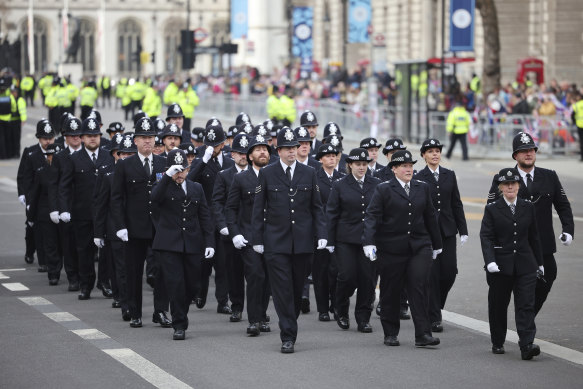 Ceremonial Metropolitan Police officers arrive at the Cenotaph ahead of the coronation of King Charles III in London.