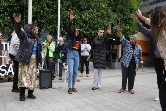 Tiwi Islanders perform a traditional dance after addressing the crowd about Santos’ appeal hearing.