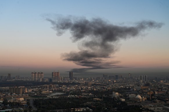 A plume of smoke rises near Erbil International Airport in Iraqi Kurdistan on March 1. 