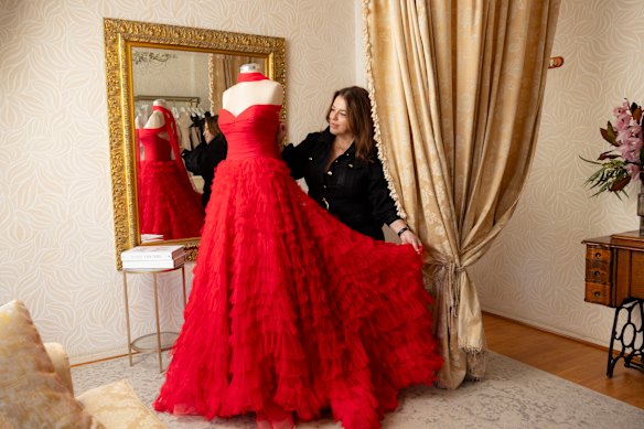 Nicky Apostolopoulos with a gown in the studio for her label Velani in Five Dock, Sydney.