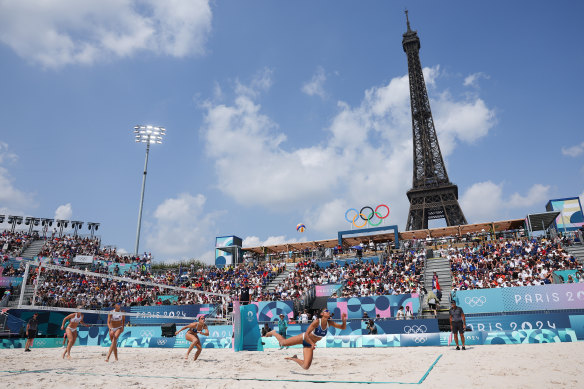 Clemence Vieira of Team France competes as the Eiffel Tower is seen in the background.