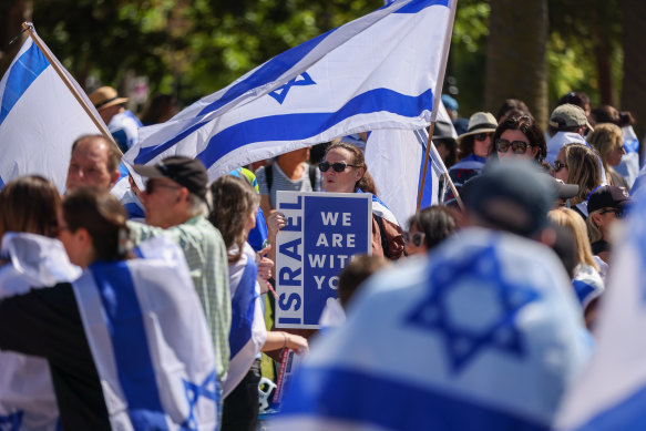 Supporters of Israel attend a Melbourne rally in solidarity for the victims of and hostages held by Hamas in Gaza.