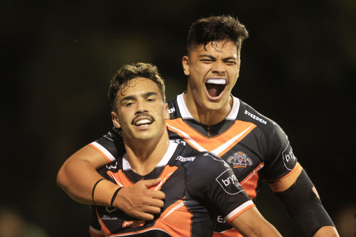 Daine Laurie and Tommy Talau celebrate a first-half try.