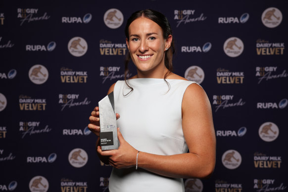 Maya Stewart poses with the Buildcorp Wallaroos Player of the Year Award.