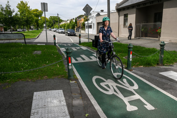 Cyclist Liz Irvin using a bike lane.