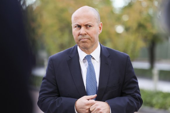 Treasurer Josh Frydenberg being asked questions by journalists at Parliament House on Tuesday.