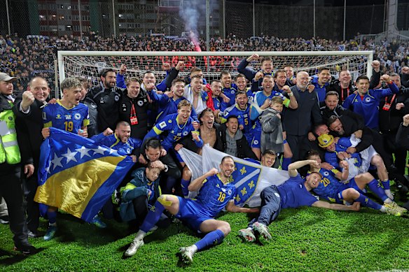Bosnia celebrates their qualifying victory.