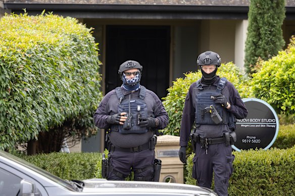 Federal police during last year’s raid.