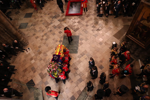 Queen Elizabeth’s coffin in the Abbey.