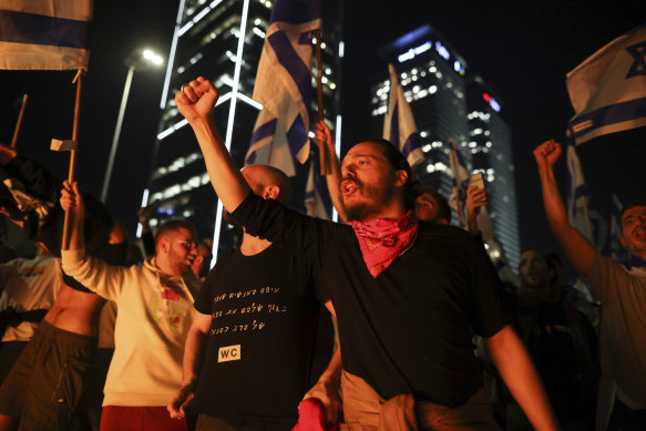 Israelis opposed to Prime Minister Benjamin Netanyahu’s judicial overhaul plan block a highway during a protest.