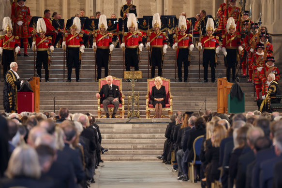 King Charles III and Camilla, Queen Consort, inside the historic Westminster Hall.