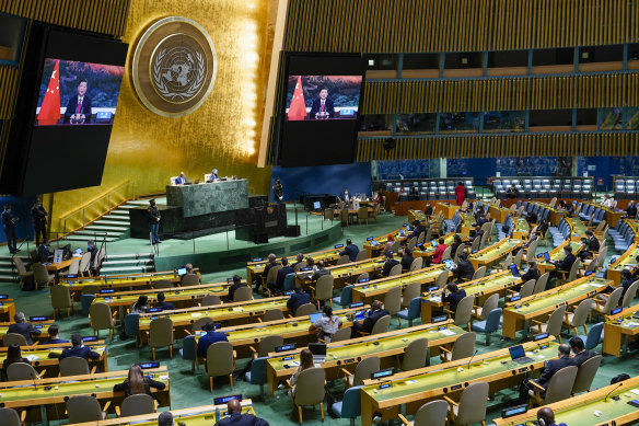 Chinese President Xi Jinping is seen on a video screen at the UN on Wednesday. 