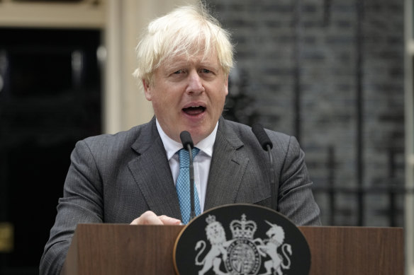 Outgoing UK Prime Minister Boris Johnson speaks outside Downing Street in London today.