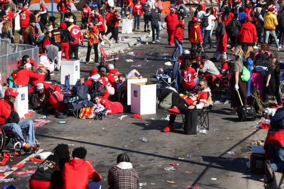 Some people take cover during a shooting at Union Station during the Kansas City Chiefs Super Bowl LVIII victory parade.