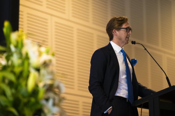 Sandy’s brother Angus Dawson speaks at the memorial.