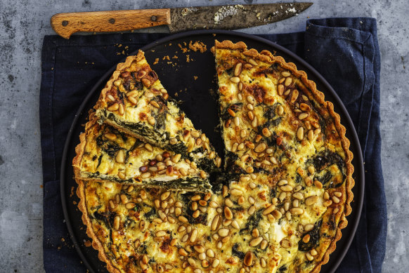 Spinach tart with pine nuts, cheese and herbs.