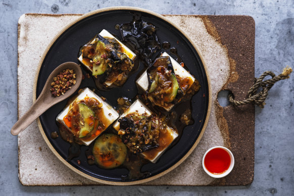 Steamed silken tofu with black vinegar and chilli oil.